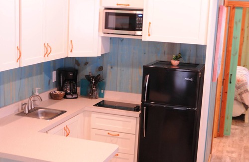 New Braunfels Cabin | Cozy Cabins near the Comal River- Cabin #1-Fiesta Theme Walk to Wurstfest