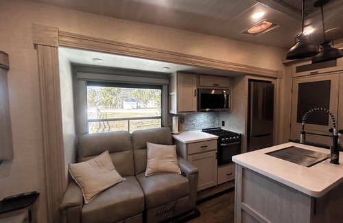 Yulee RV Rental | Cozy Camper on a mini farm with marsh front views!