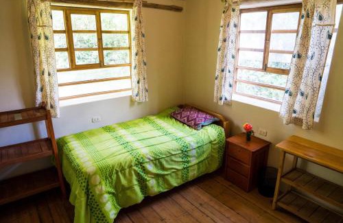 Huaran Ski Chalet | Cozy Casita in the Sacred Valley Breathtaking Waterfall and Mountains View