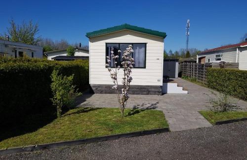 Berkhout Ski Chalet | Cozy chalet near Amsterdam at Camping Venhop