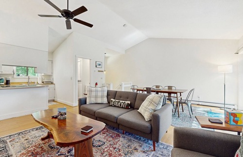 Quechee Condo | Cozy condo w/balcony, river view, electric woodstove, w/d, wifi, kitchen, a/c