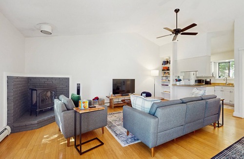 Quechee Condo | Cozy condo w/balcony, river view, electric woodstove, w/d, wifi, kitchen, a/c