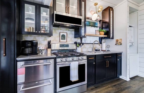 Lafayette Cottage | Cozy Cottage · Cozy tiny house living w/beautiful courtyard