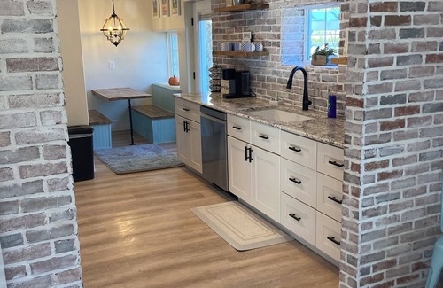 Monroe House | Cozy Cottage in Monroe. Newly remodeled with fun amenities including hot tub!
