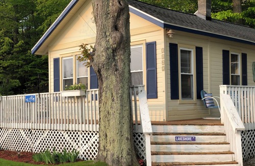 Ludington Cottage | Cozy cottage overlooking Hamlin Lake, a few minutes from downtown!