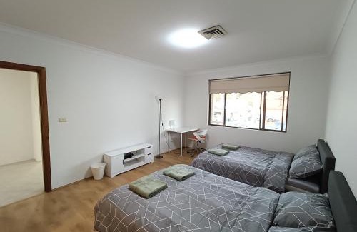 Merrylands House | Cozy Family Room with Private Bathroom in Spacious Home - M8