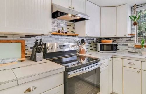 New Smyrna Beach House | Cozy family sized beach house! Short Walk to the Atlantic Ocean