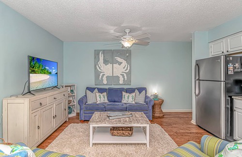 North Myrtle Beach Condo | Cozy, family friendly, 2BR/2BA in Cherry Grove steps to the beach.