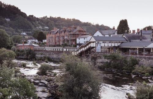Llangollen House | Cozy fireplace next to River Dee, Hot tub Escape 4BR House Llangollen