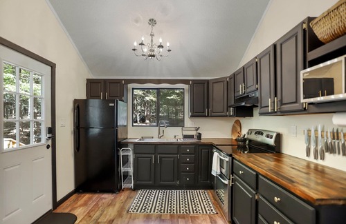 The Woods House | Cozy getaway in the woods of Hedgesville, WV. Pet friendly!