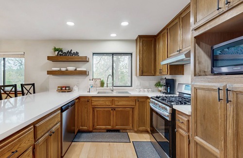 Groveland House | Cozy Groveland home with spacious deck, shared pool access, and Wifi