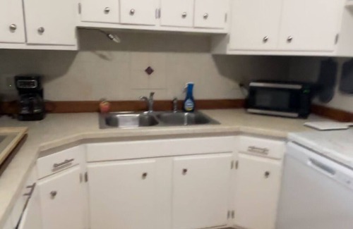 Sheridan House | Cozy home with fenced yard and pet friendly.