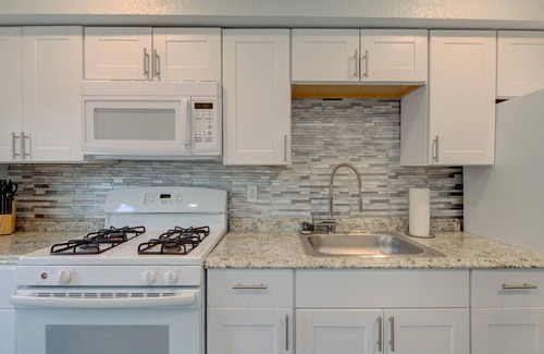 Edgewood House | Cozy Home with Hot Tub and private backyard