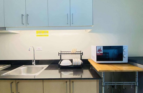 Iloilo Condo | Cozy Iloilo City Condo Room with Shared Pool