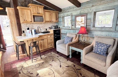 Sandpoint Cabin | Cozy Lakefront Cabin on Acreage with Dock, Disc Golf, Boat Launch & Lift