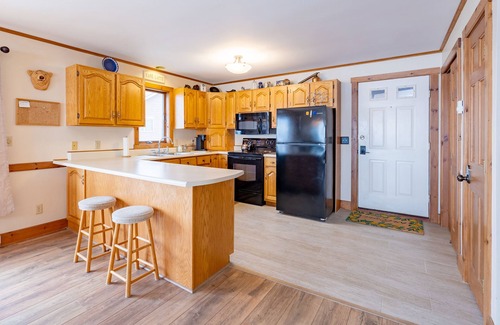 Newport Center Apartment | Cozy Lakeside Condo with a heated pool!