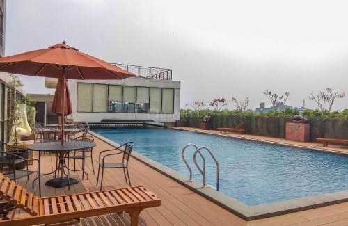 Depok Apartment | Cozy Living and Minimalist Studio Dave Apartment By Travelio