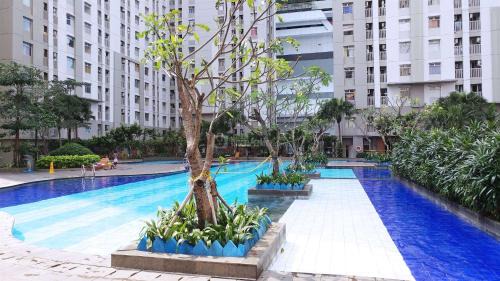 Pluit Apartment | Cozy Living Studio at Green Bay Pluit Apartment By Travelio