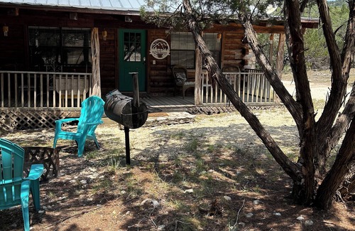 Concan Cabin | Cozy Log Cabin called Buffalo Horizon. Sleeps 4. Close to Frio River