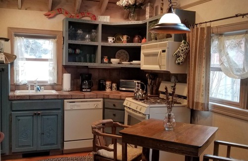 Redstone Cabin | Cozy Log Cabin w/Hot Tub on Redstone Blvd, beautifully landscaped for privacy.