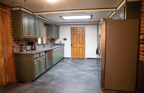 Dola Cabin | Cozy log cabin with pond nestled within 10 wooded acres. Accommodates up to 12!