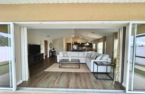 Wildwood House | Cozy Oasis in Prime Location with Sunset Lake View, Golf Cart and Bathtub