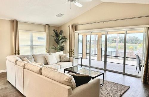 Wildwood House | Cozy Oasis in Prime Location with Sunset Lake View, Golf Cart and Bathtub