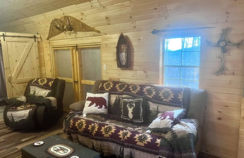 Courthouse-Collins Settlement Cabin | Cozy one-bedroom cabin nestled in the woods beside Stonewall Jackson Resort.