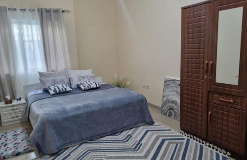 Mussafah House | Cozy Private Rooms in Central Shabia 12, Free Wi-Fi & Kitchen Access