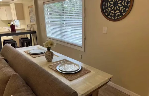 Odessa House | Cozy, Quiet Keystone Cottage. Nestled in a lush Old Florida neighborhood.