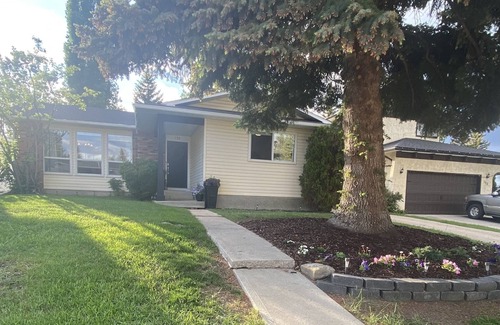 Southwest Calgary House | Cozy Renovated Bungalow Backing on Braeside Park