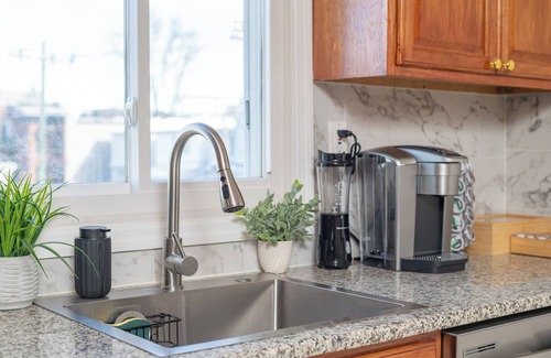 The Heights House | Cozy retreat with complimentary parking and arcade game room! Minutes to NYC
