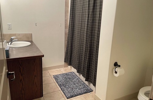 Sylvan Lake House | Cozy room suite located on a lake town w ensuite bathroom and toilet