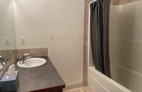Sylvan Lake House | Cozy room suite located on a lake town w ensuite bathroom and toilet