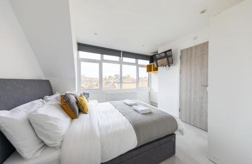 St. George's Apartment | Cozy Rooms with Shared Kitchen and Laundry Area