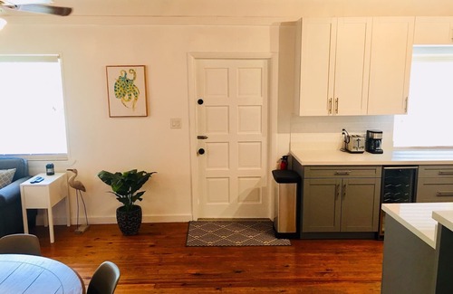 Alice Town House | COZY SEASIDE 2 BED/2 BATH BIMINI COTTAGE-BAY SIDE VIEW -soft green colored house