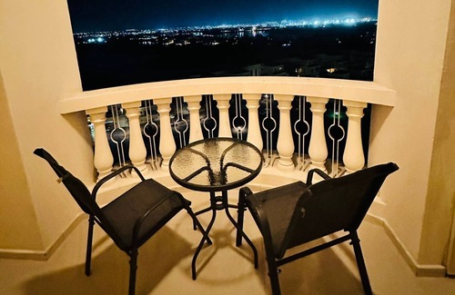 Al Hamra Village Apartment | Cozy studio with WiFi and fitness room with stunning lagoon view