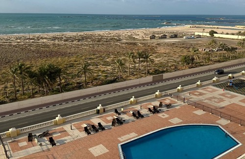 Al Hamra Village Apartment | Cozy studio with WiFi and fitness room with stunning lagoon view