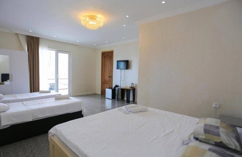 Batumi Apartment | Cozy studio in tranquil Batumi with WiFi, fitness room, AC