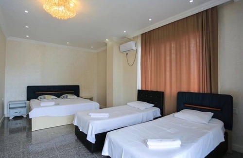 Batumi Apartment | Cozy studio in tranquil Batumi with WiFi, fitness room, AC