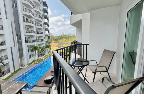 Kram Condo | Cozy Studio near the beach, AC, Wifi, Kitchen, Pools and Fitness