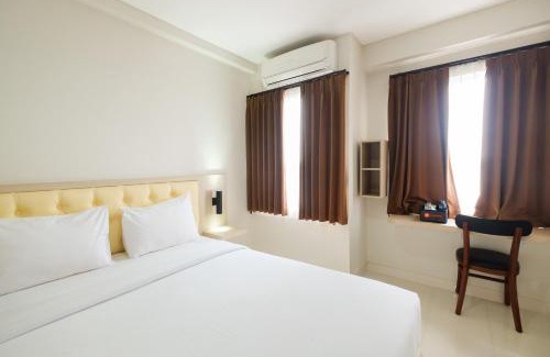 Cikarang Apartment | Cozy Studio with City View at Elvis Tower Apartment By Travelio