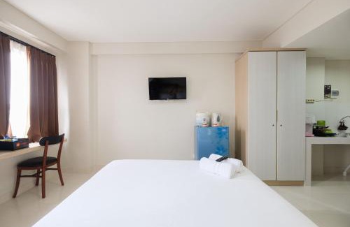 Cikarang Apartment | Cozy Studio with City View at Elvis Tower Apartment By Travelio