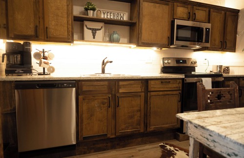 Fort Worth Apartment | Cozy studio with queen pullout sofa on scenic working ranch in Fort Worth.