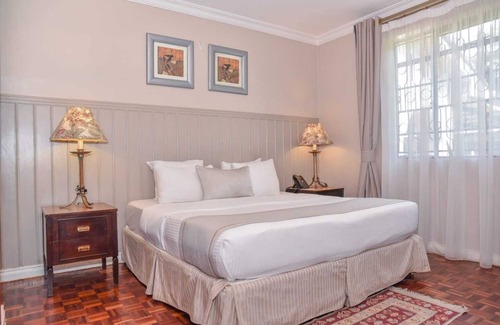 Muthaiga Hotel | Cozy Superior Room with AC & Fitness Access in Vibrant Nairobi