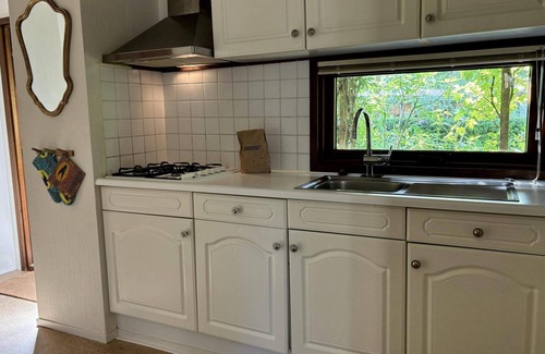 Municipality of Harderwijk House | Cozy Tiny Lodge (48 m²) for 2-3 persons (2 adults and 1 child) with basic facilities, garden and terrace.