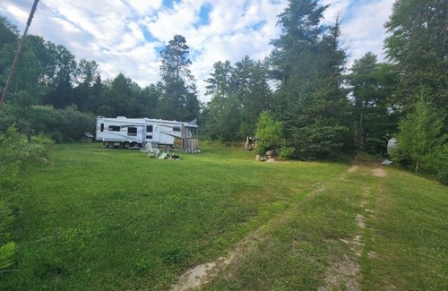 Greater Madawaska RV Rental | Cozy trailer right on the Madawaska River