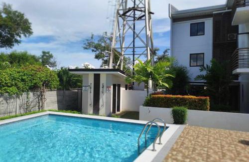 Talisay Apartment | Cozy TriG Place near SM Seaside with Wifi Netflix free swimming pool & parking