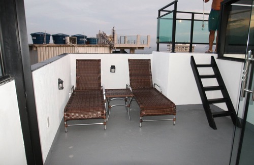 Zona Sul Apartment | Cozy Two Floor Favela Apartment With Hot Tub In Rio de Janeiro 8 Mins From Beach