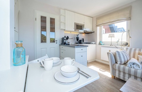 Westerland Apartment | Cozy vacation apartment for max. 2 persons with balcony and view of the dunes.